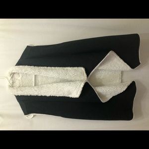 Reversible charcoal and cream vest. NWT